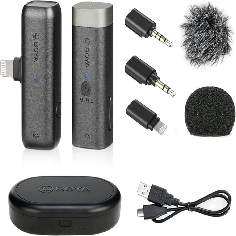BOYA BY-WM3D Dual Wireless Microphone System with two transmitters, receiver, USB charging cable, 3.5mm adapters, foam windscreen, furry wind muff, and charging case.