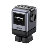 UGREEN Uno 100W GaN Charger 45514 with 3 USB-C ports, 1 USB-A port, TFT smart display, compact robot-style design, and US plug for fast charging laptops, phones, tablets, and accessories.