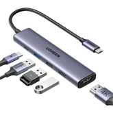 Ugreen USB hub with multiple ports and cables on a white background