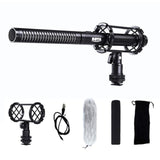  BOYA BY-PVM1000 shotgun microphone with shock mount, dual mic holders, XLR cable, furry windscreen, foam windscreen, and carrying pouch.