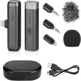  BOYA BY-WM3D Dual Wireless Microphone System with two transmitters, receiver, USB charging cable, 3.5mm adapters, foam windscreen, furry wind muff, and charging case.