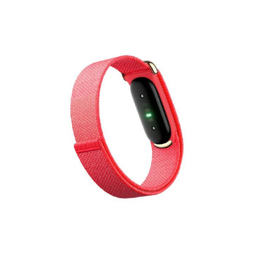 Google Fitbit Air red screenless fitness tracker with lightweight wristband
