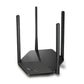 Mercusys MR60X AX1500 WiFi 6 router top side angle showing slim black design and antennas.